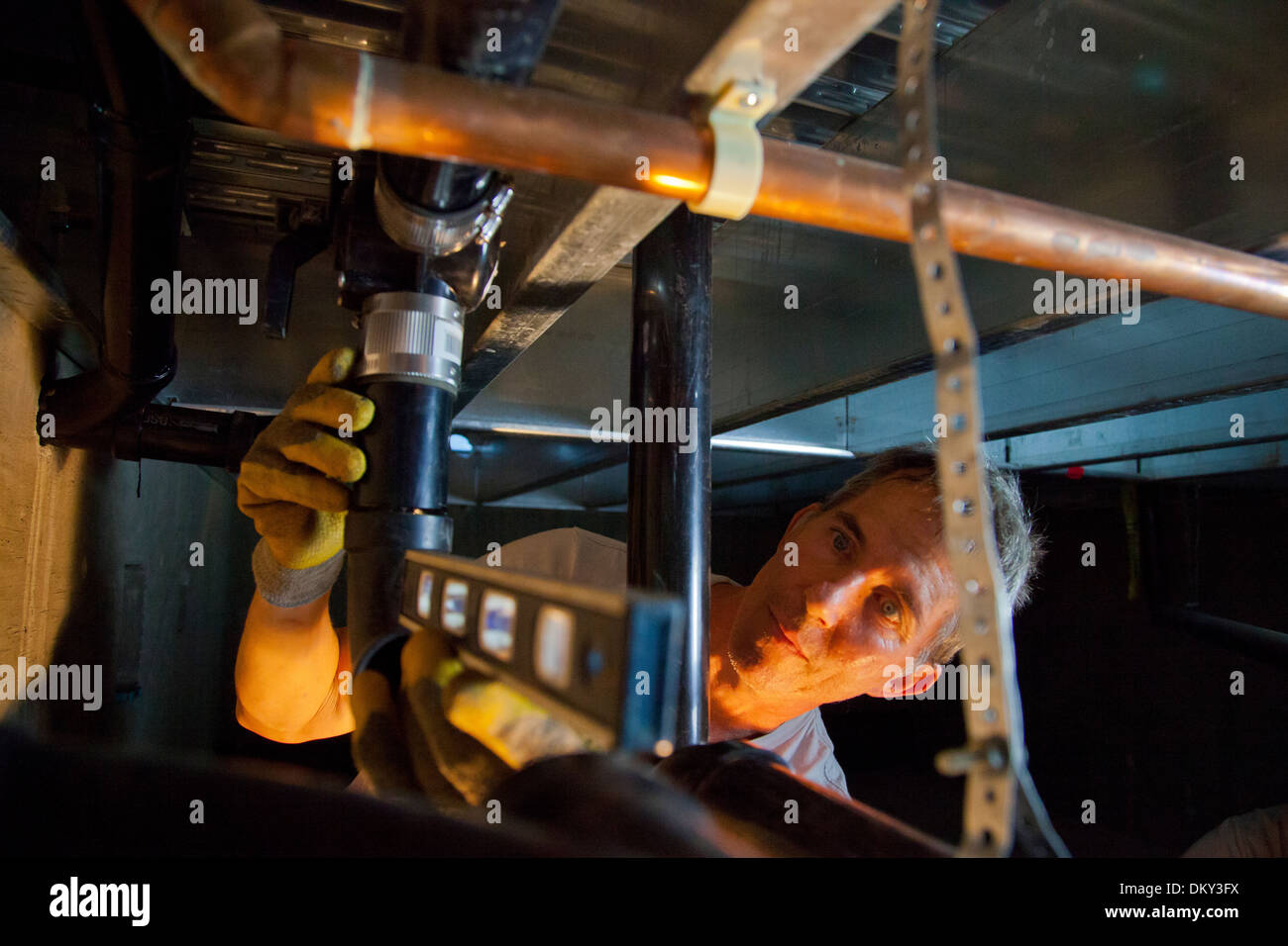 Installation of diverter valve for greywater system at new green home