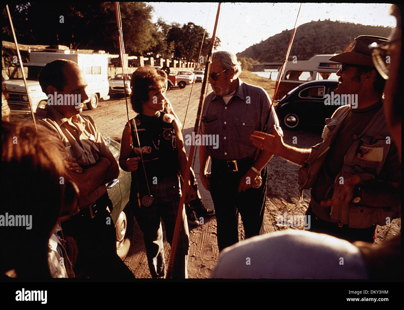 GAME WARDEN JOHN PEABODY WITH PRESIDENT OF FLY FISHERMEN FOR CONSERVATION, STUD McCHESNEY (RIGHT), AND MEMBERS 542562 Stock Photo