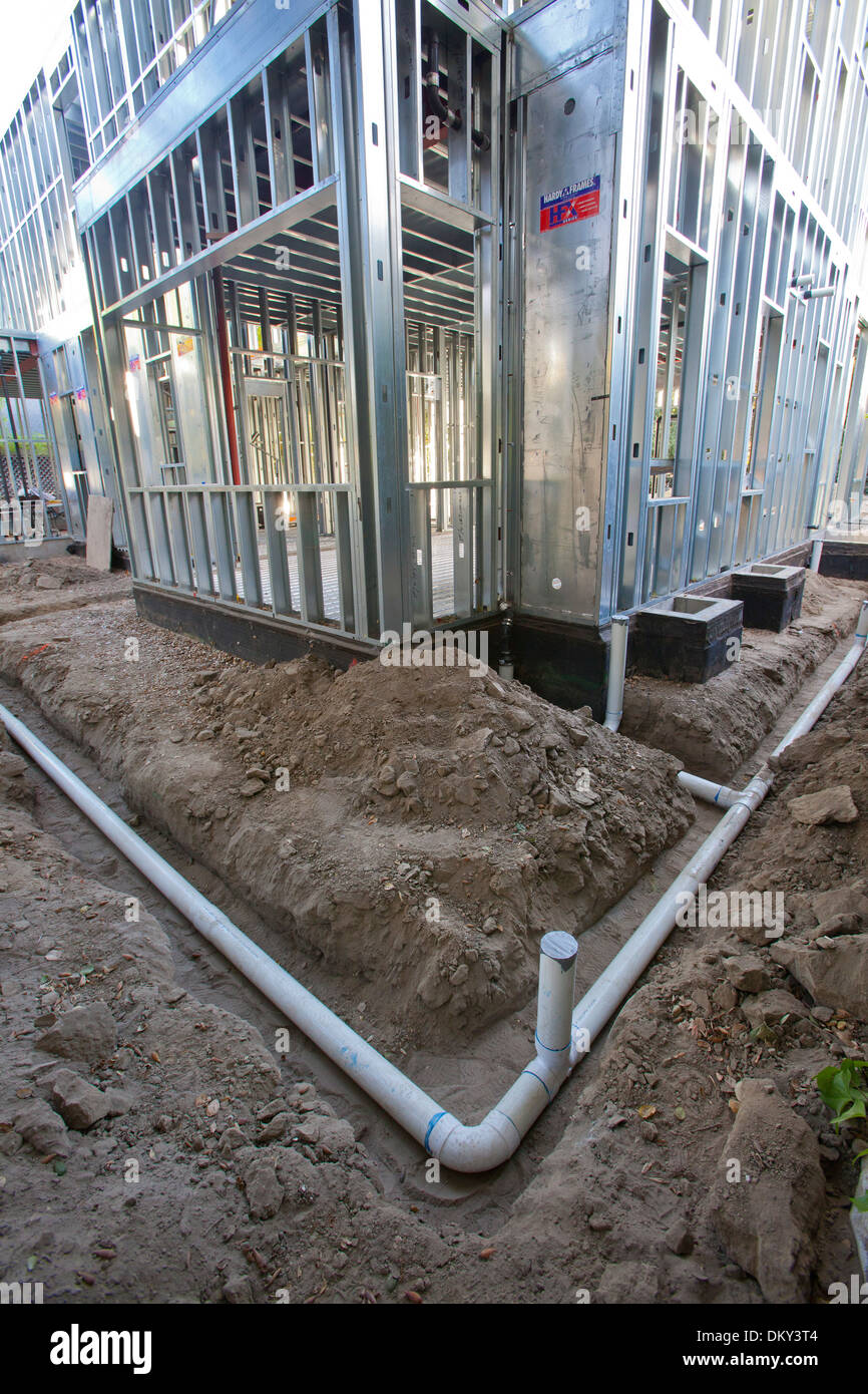 Poly Vinyl Chloride, PVC Pipes being installed for rainwater harvesting