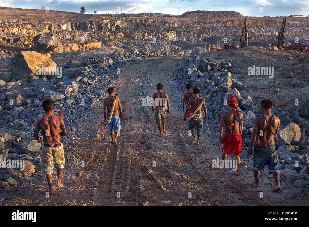 Belo Monte, Para, Brazil. 27th May, 2013. Indigenous Munduruku men survey the quarry site for the Belo Monte Dam. On May 27th, an indigenous group made up predominantly of Munduruku occupied the dam and halted construction on the main turbine site. The indigenous Xikrin people live on the Bacaja, a tributary of the Xingu River, where construction of the Belo Monte Dam is reaching peak construction. Some scientists warn that the water level of the Bacaja will decrease precipitously due to the dam thus effecting agriculture for survival. (Credit Image: © Taylor Weidman/ZUMA Press) Stock Photo