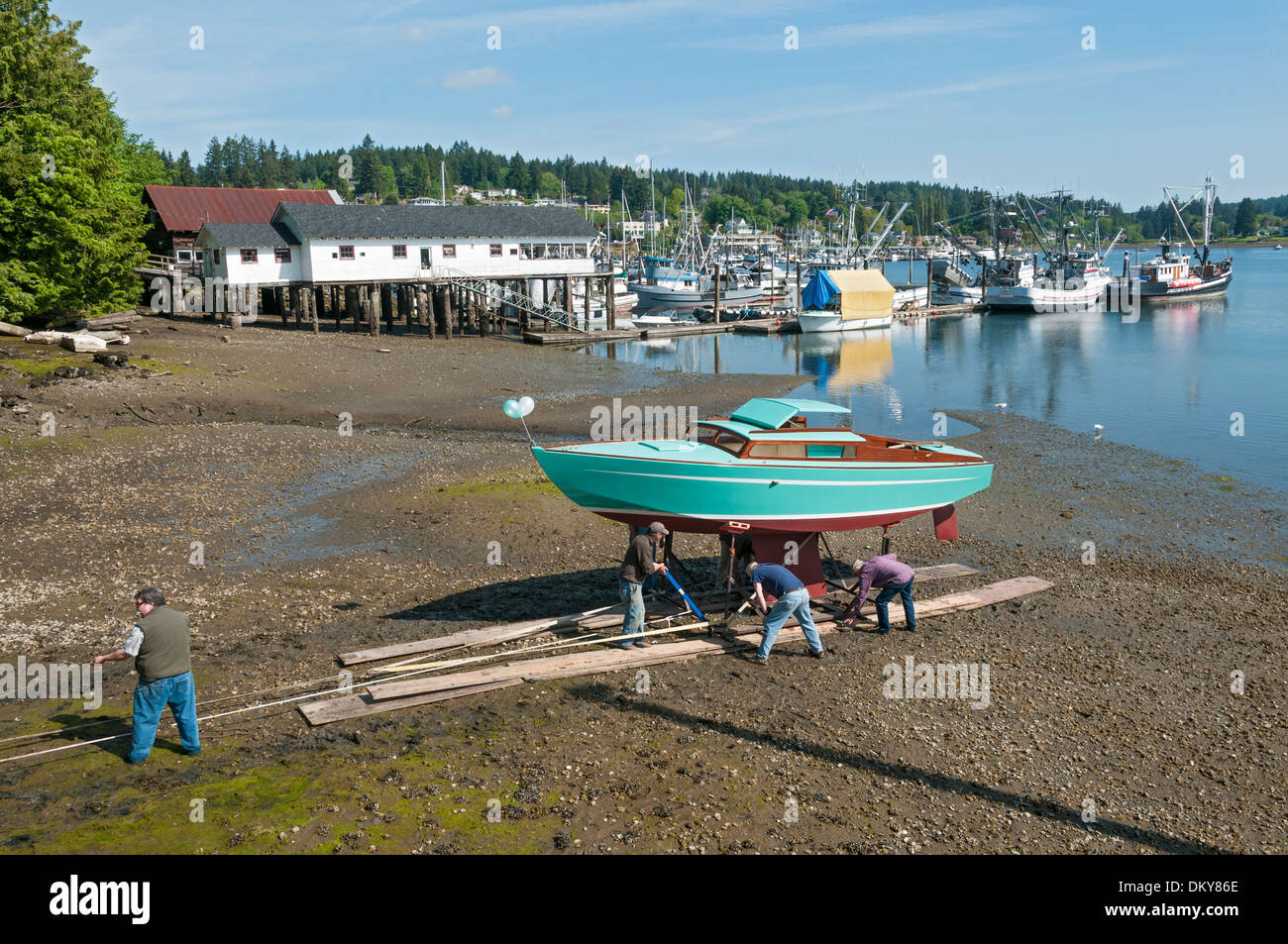 Washington, Gig Harbor, Historic Eddon Boatyard, Gig Harbor BoatShop, launching restored Thunderbird No. 2 sailboat Stock Photo