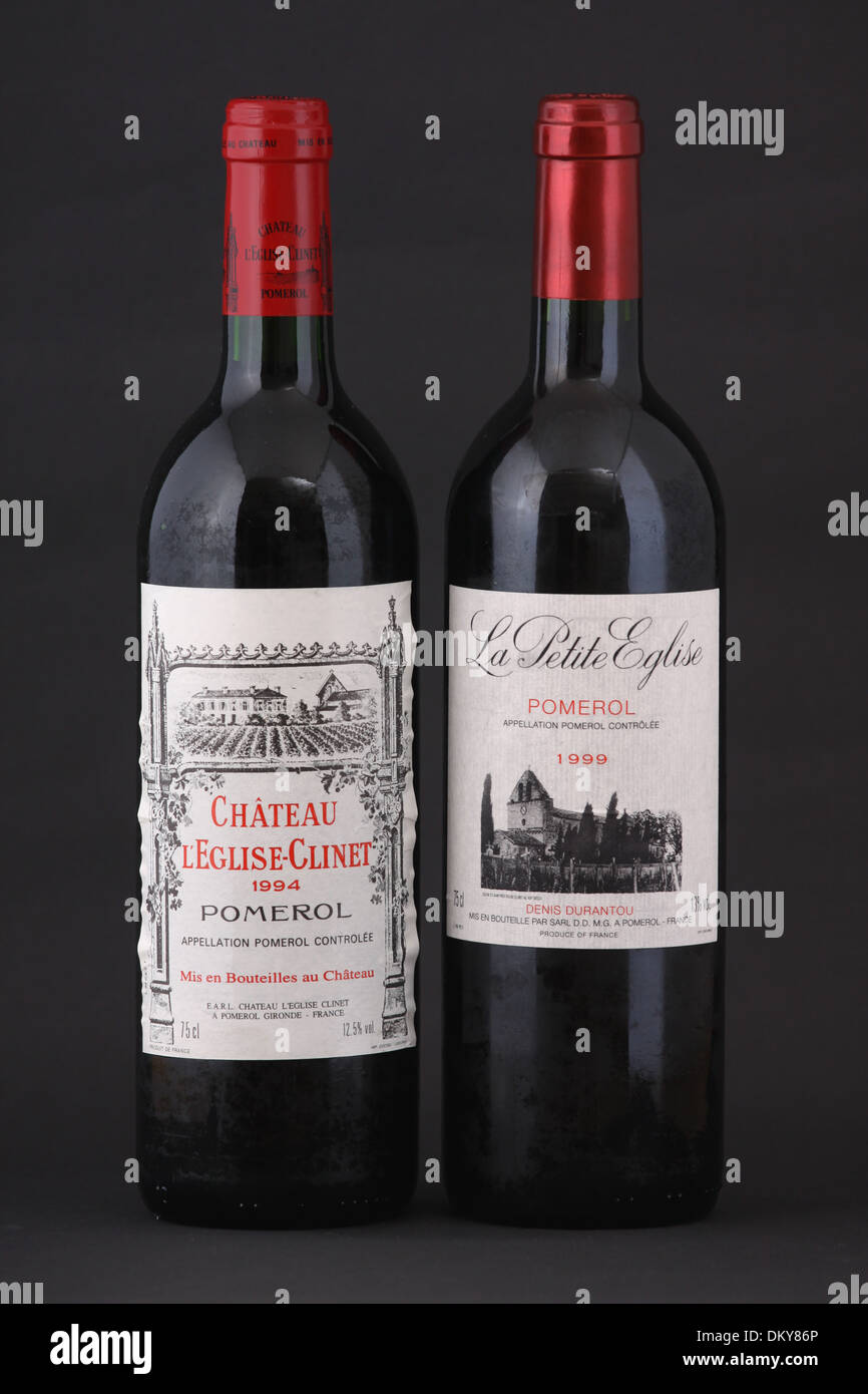 Two bottles of French red wine, Chateau l'Eglise-Clinet, Pomerol of year 1994 and La Petite Eglise of year 1999 Stock Photo