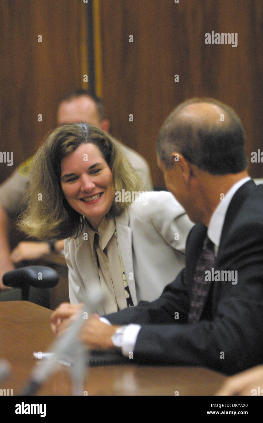 Oct. 10, 2001 - Santa Monica, CA, United States - K23067MR:  Comedienne Paula Poundstone and her attorney Steven Cron share a laugh October 10, 2001 in Santa Monica, CA.  Poundstone has been sentenced to five years probation for child abuse and infliction of injury upon a child.  Santa Monica Superior Court Judge Bernard J. Kamins also noted that her privilege to have foster childr Stock Photo