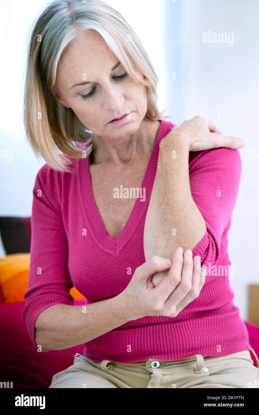 ELBOW PAIN IN AN ELDERLY PERSON Stock Photo Alamy