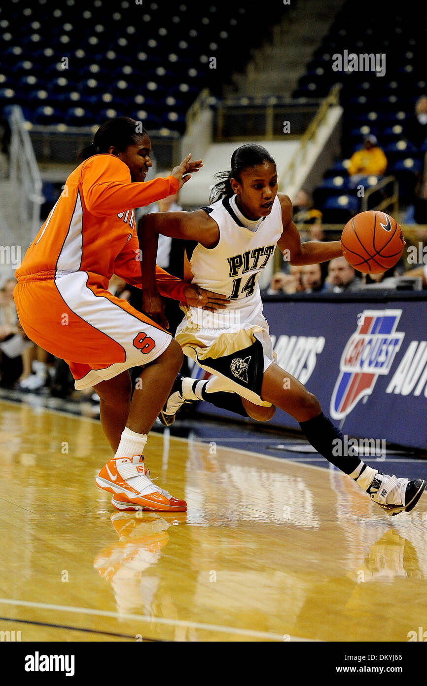 Feb. 02, 2010 - Pittsburgh, PA, U.S - 2 February 2010: University of Pittsburgh junior guard Jania Sims (14) breaks past Syracuse University junior guard Tasha Harris (11) in the first half of NCAA Big East women's basketball  at the Petersen Events Center in Pittsburgh, PA...Syracuse won in overtime 87-80..Mandatory Credit: Dean M. Beattie / Southcreek Global Media (Credit Image:  Stock Photo