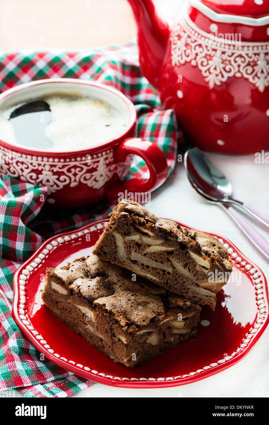 Chocolate pie and cup of coffee with festive decorations, selective focus Stock Photo