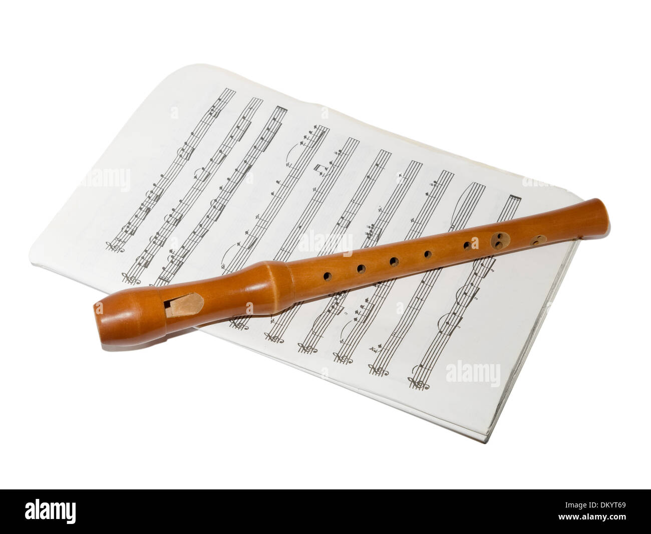 A soprano recorder on a sheet music Stock Photo