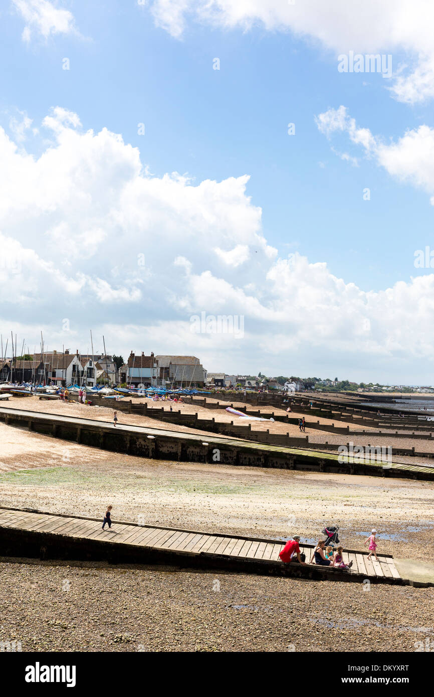 People enjoying the beach at Whitstable, Kent Stock Photo