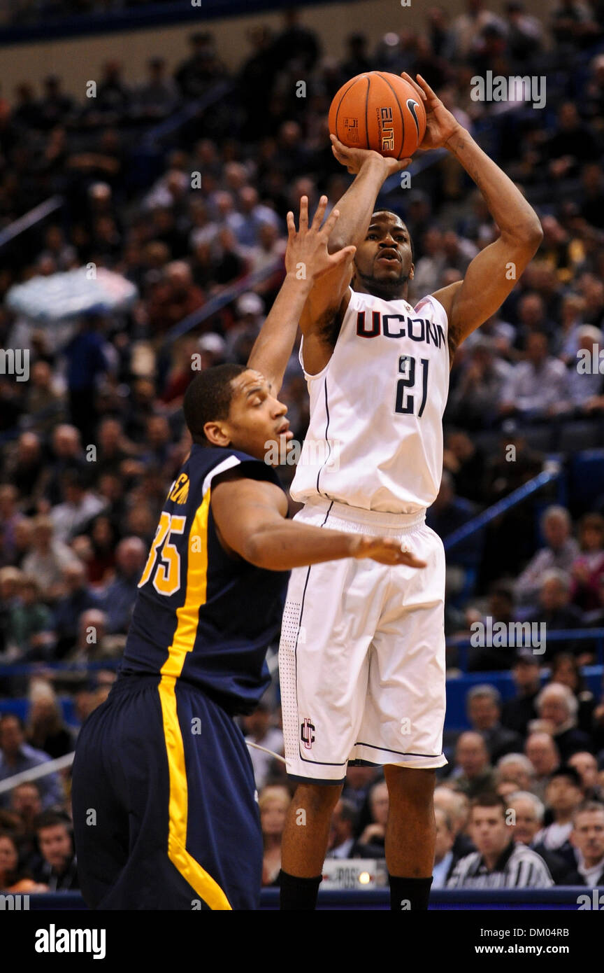 Feb. 22, 2010 - Hartford, Connecticut, U.S - 22 February 2010: Connecticut's Stanley Robinson (21) shoots over West Virginia's Wellington Smith (35) during game action in the first half. Connecticut defeated #7 West Virginia 73 - 62  at the XL Center in Hartford, Connecticut. (Credit Image: © Geoff Bolte/Southcreek Global/ZUMApress.com) Stock Photo