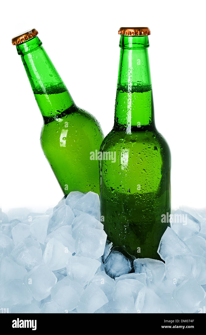 Two bottles of beer on ice isolated Stock Photo Alamy