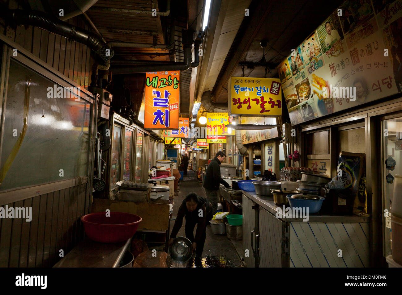 Alley of Galchi (beltfish) specialty restaurants in shijang (traditional market) - Seoul, South Korea Stock Photo