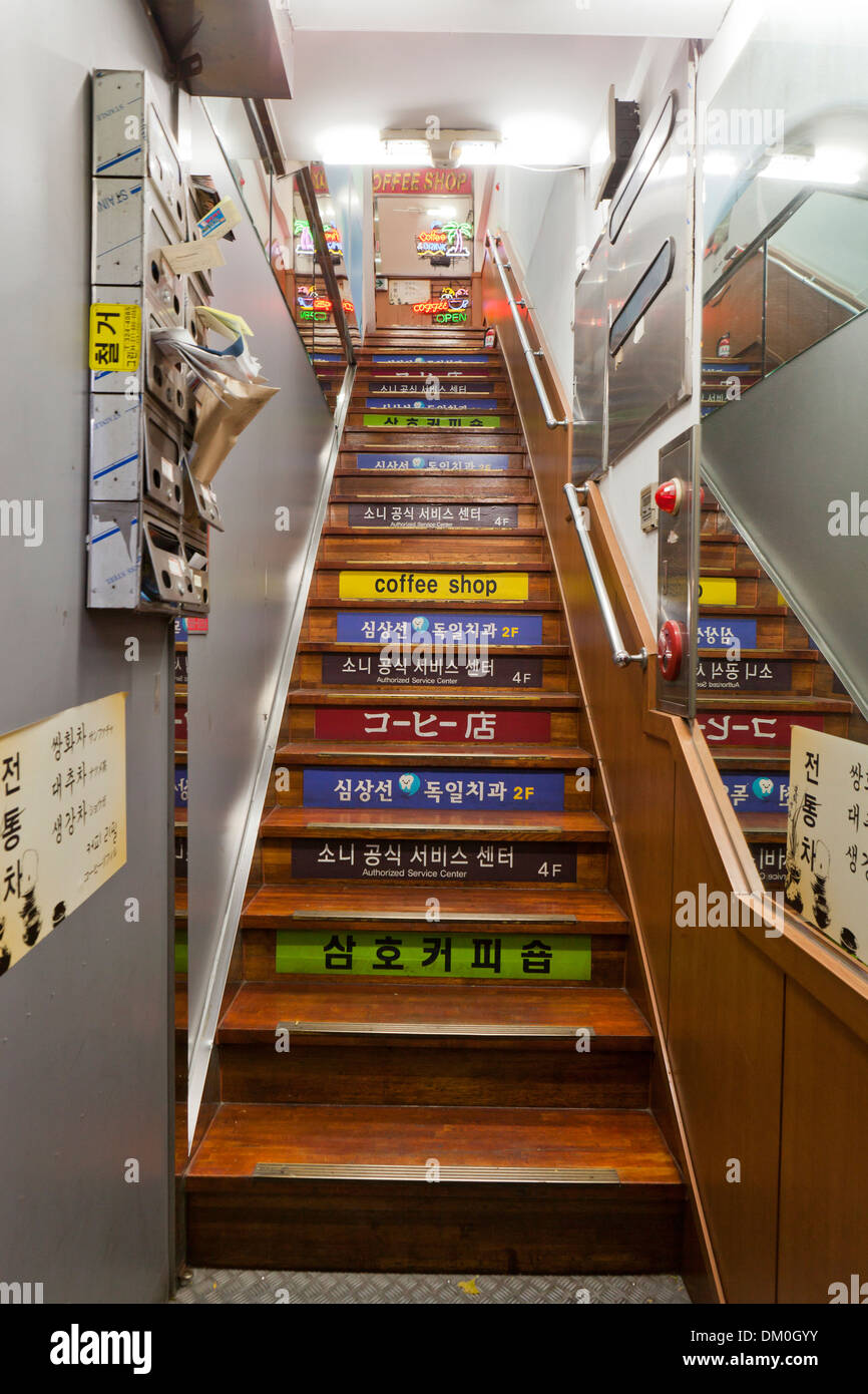 Building directory on stairway steps - South Korea Stock Photo