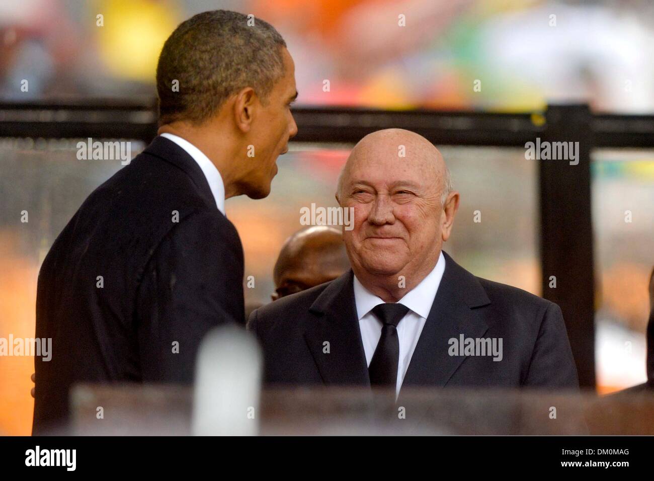 Johannesburg, South Africa. 10th Dec, 2013.  US President Barak Obama and FW De Klerk attending Nelson Mandela's public Memorial Service at the FNB stadium on December 10, 2013, in Johannesburg, South Africa. The Father of the Nation passed away quietly on the evening of December 5, 2013 at his home in Houghton with family. He will be buried in Qunu for the official State funeral on December 15, 2013. Credit:  Gallo images/Alamy Live News Stock Photo
