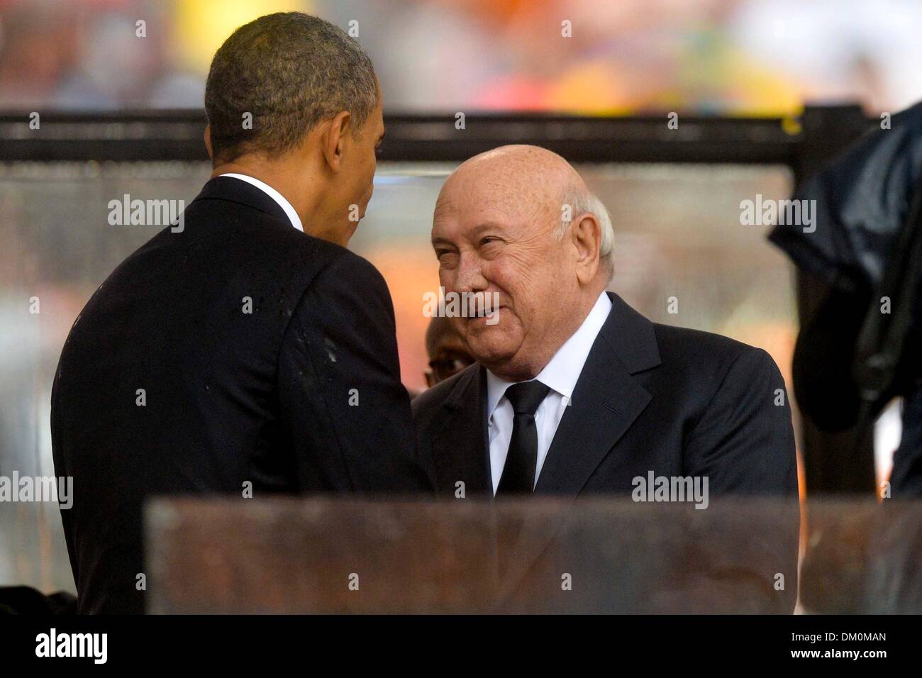 Johannesburg, South Africa. 10th Dec, 2013.  US President Barak Obama and FW De Klerk attending Nelson Mandela's public Memorial Service at the FNB stadium on December 10, 2013, in Johannesburg, South Africa. The Father of the Nation passed away quietly on the evening of December 5, 2013 at his home in Houghton with family. He will be buried in Qunu for the official State funeral on December 15, 2013. Credit:  Gallo images/Alamy Live News Stock Photo