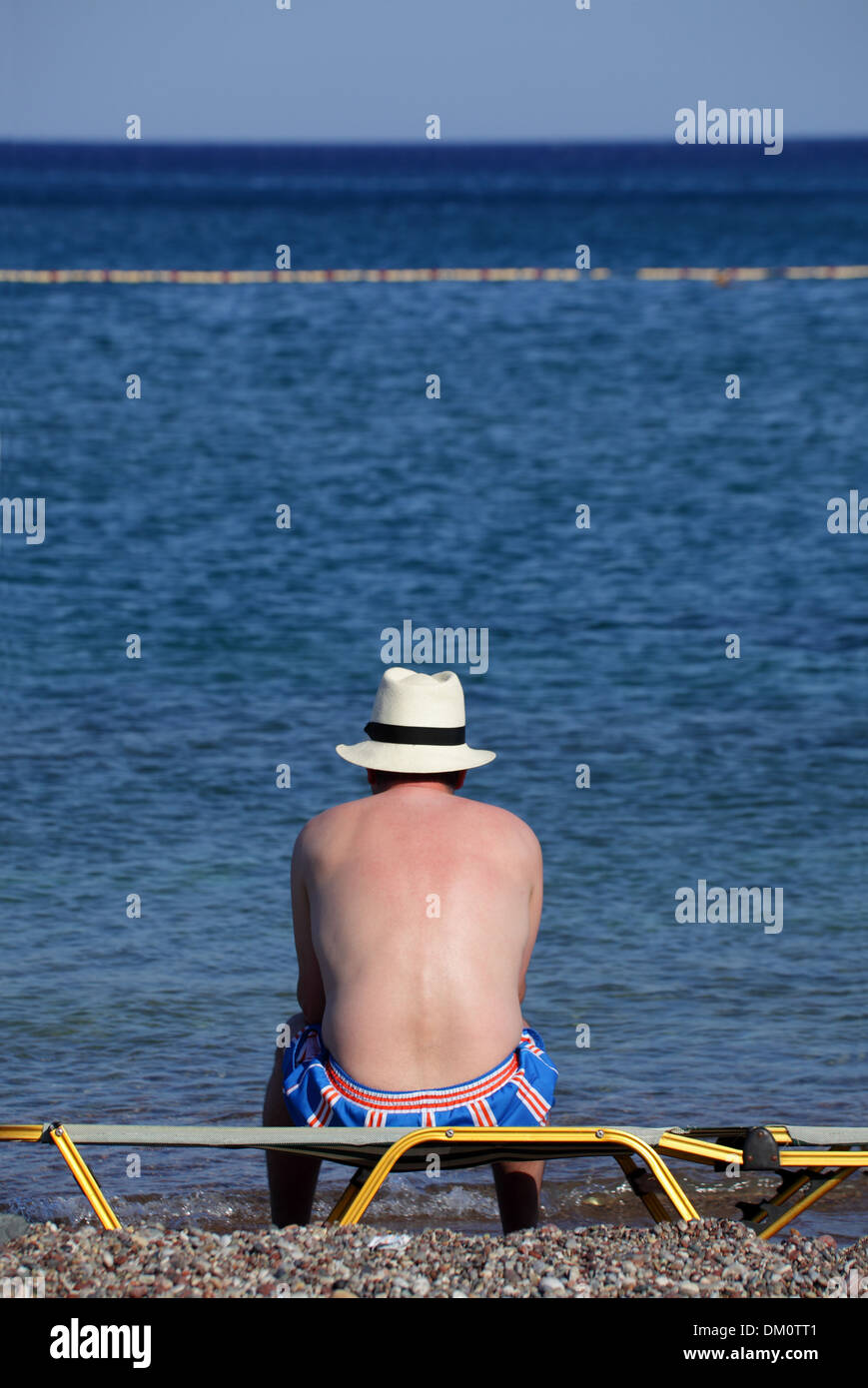 On a sun lounger hi-res stock photography and images - Alamy