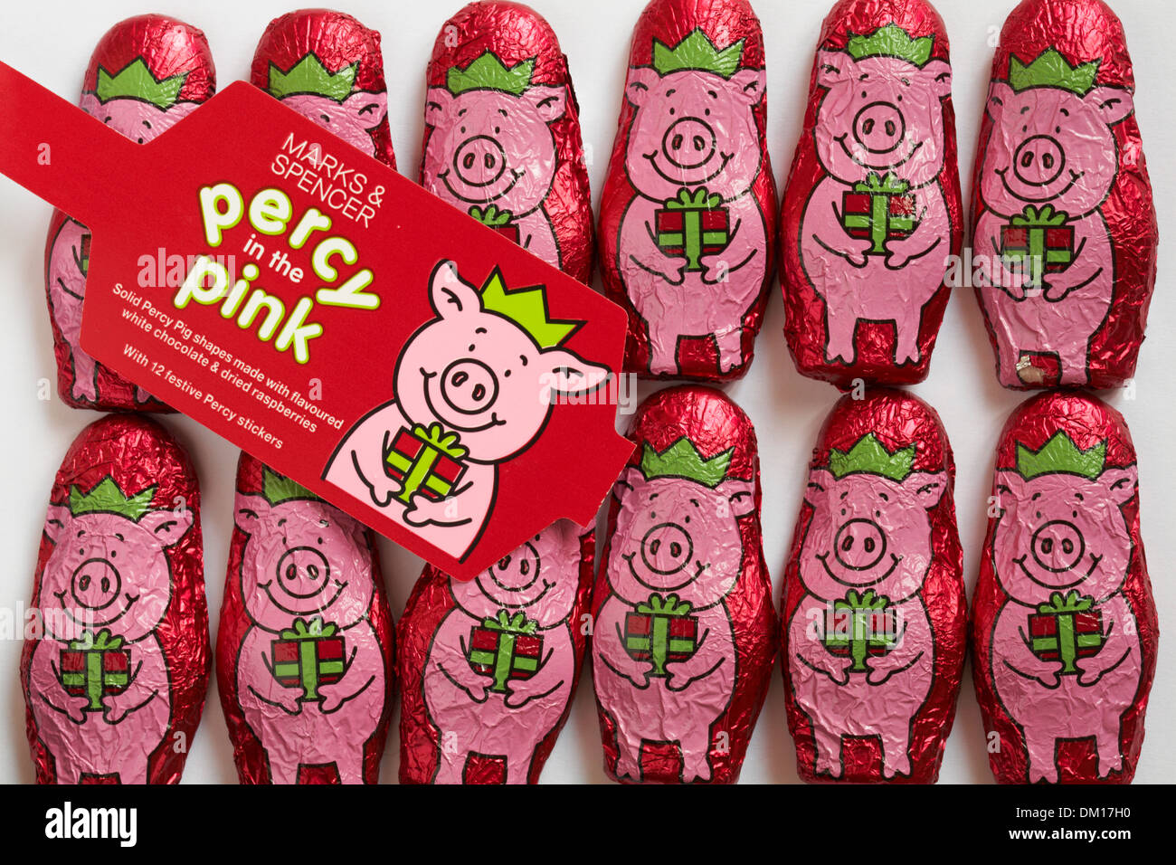 Marks & Spencer percy in the pink solid percy pig shapes made with flavoured white chocolate & dried raspberries Stock Photo