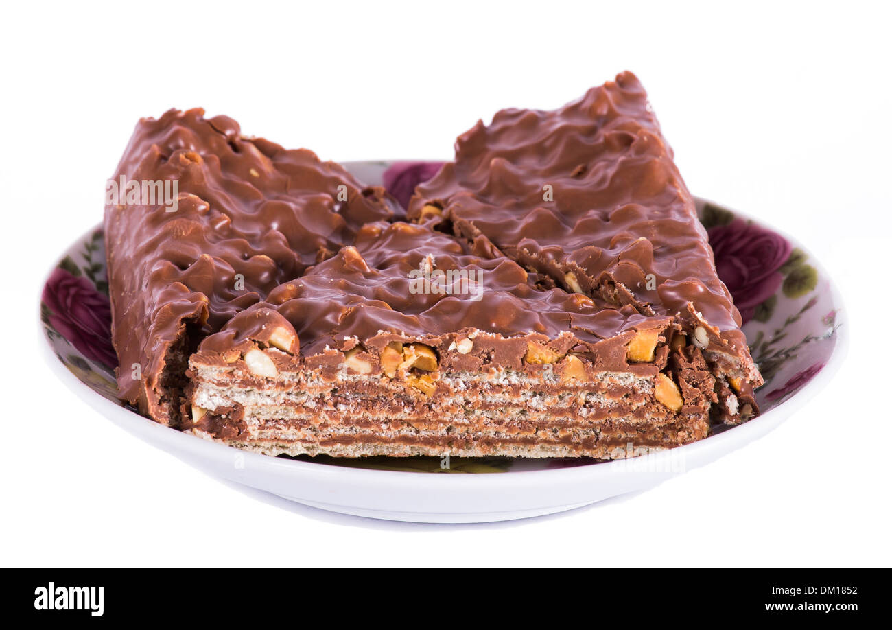 Cake with nuts and chocolate on white background Stock Photo