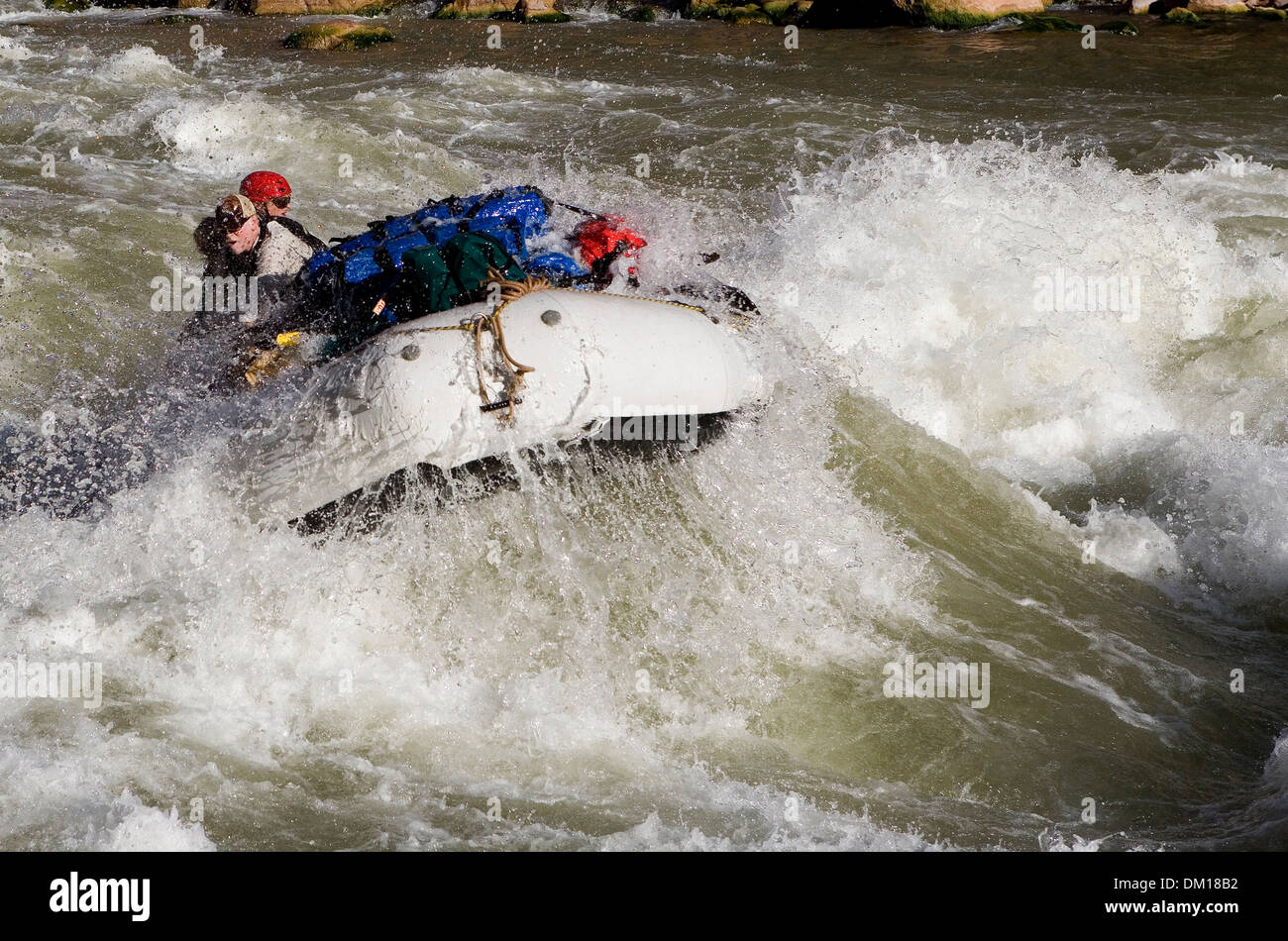 Rafting through white water rapids in the Grand Canyon. Stock Photo