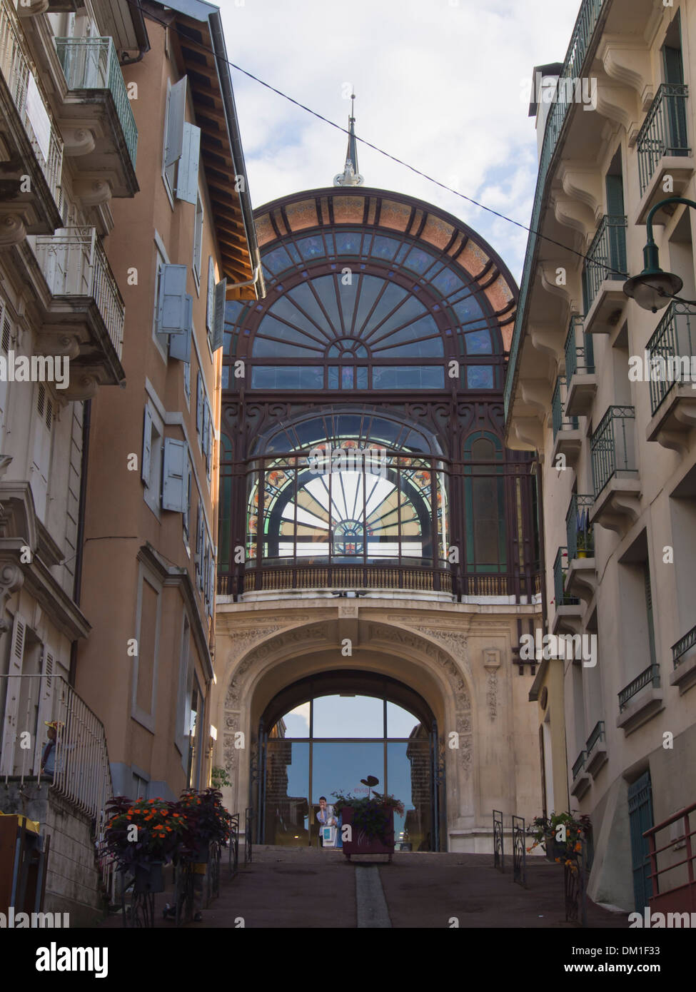 Narrow street with old entrance to the Evian water source plant in