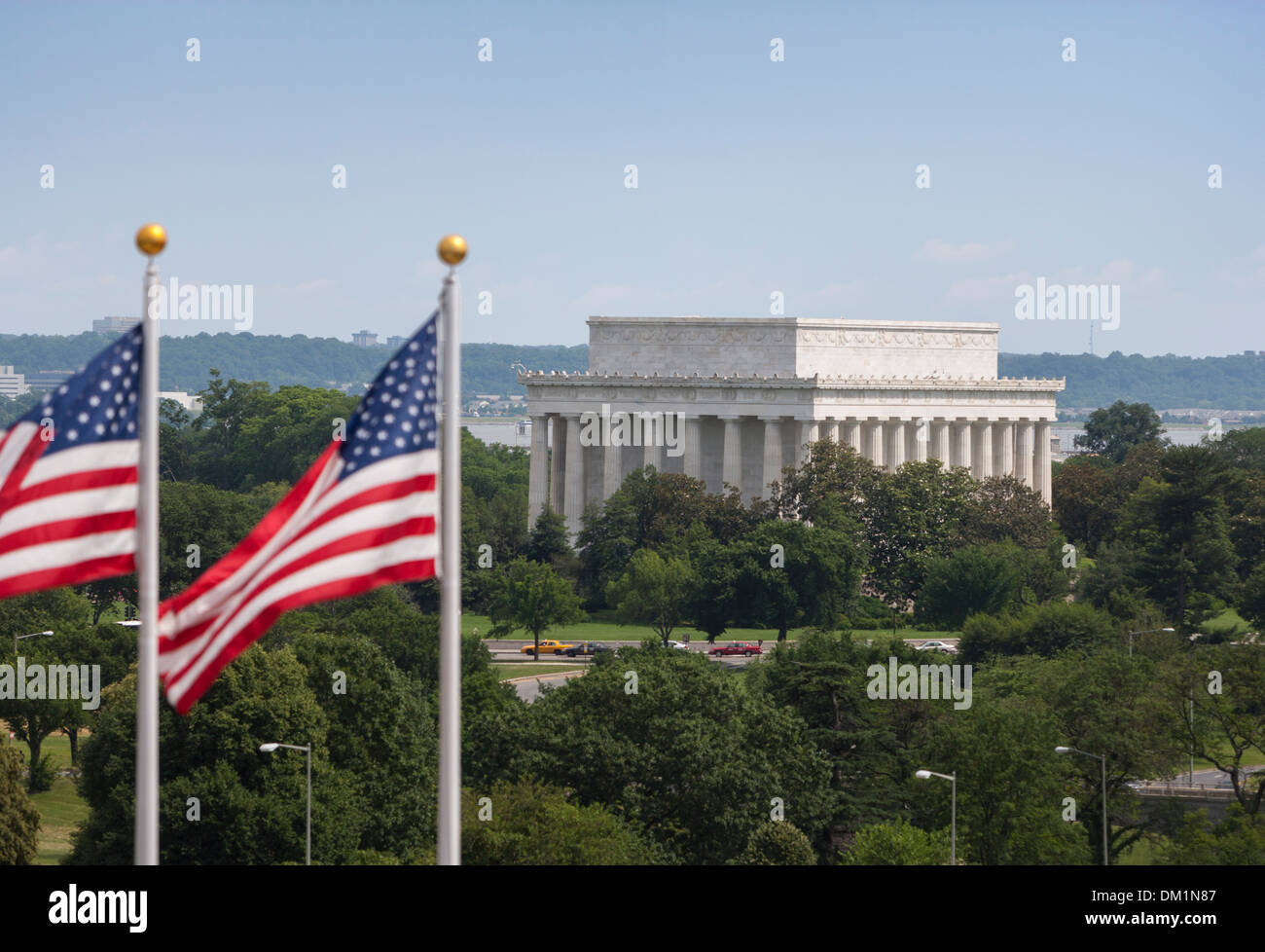 The Lincoln Memorial and US flags as seen from the Kennedy Center for the Performing Arts. Stock Photo