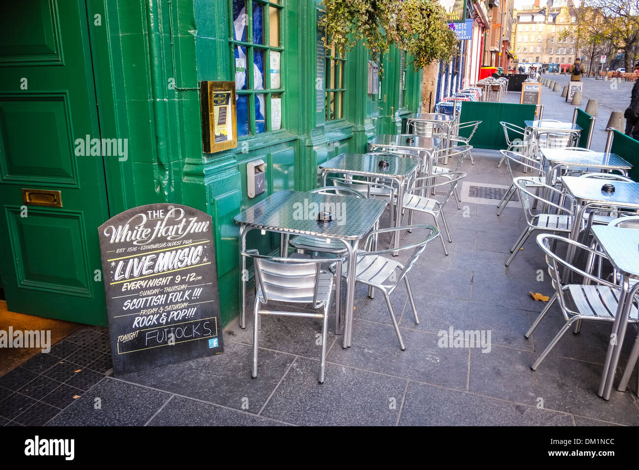 Tables and chairs outside the 'White Hart Inn' pub in Edinburgh's