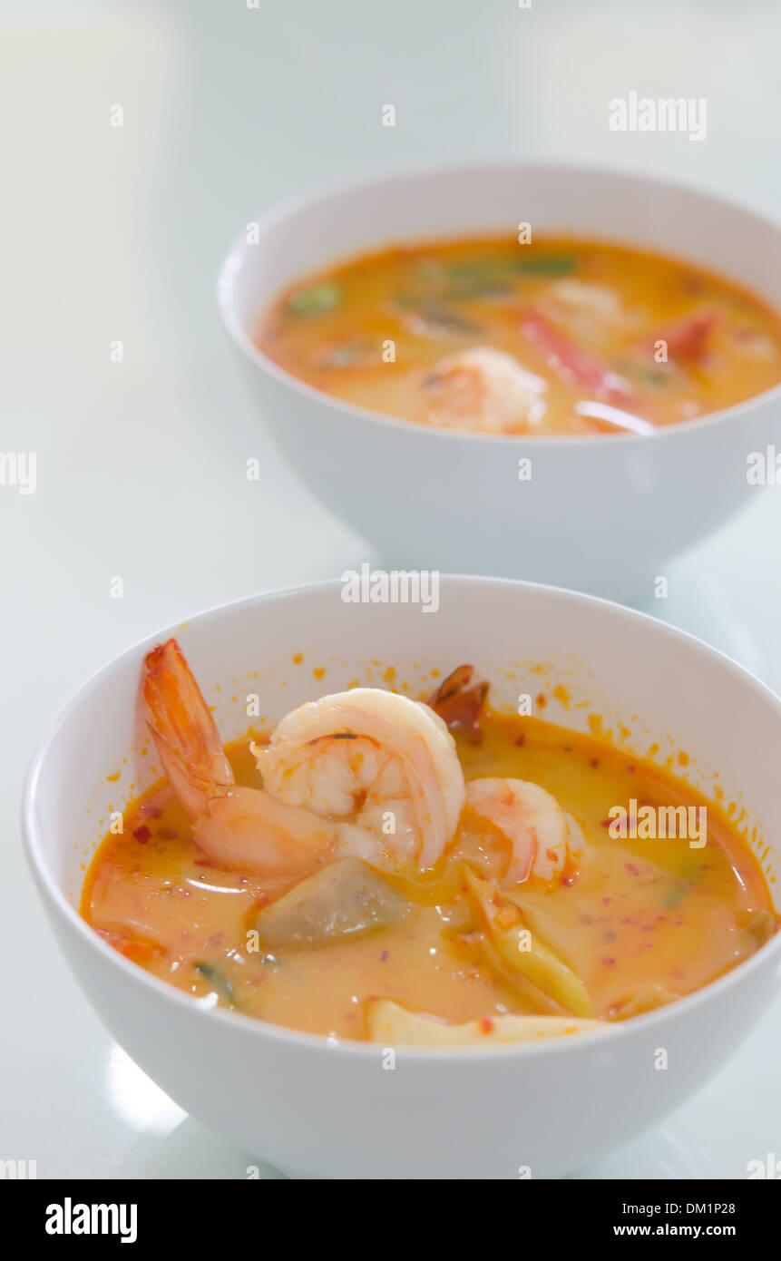 Thai hot and spicy seafood soup with shrimp and vegetable in white bowl