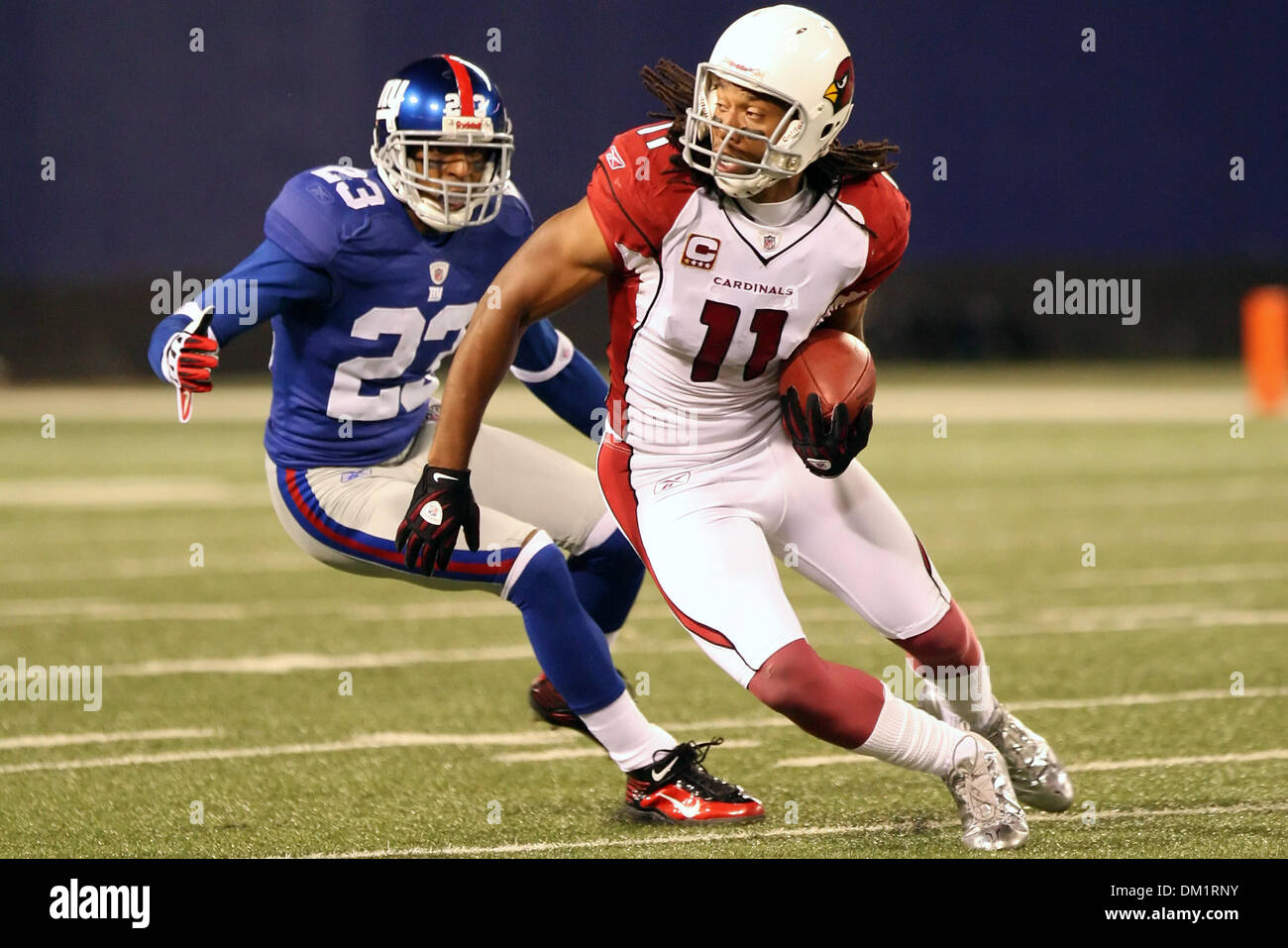25  October 2009:   Arizona Cardinals #11 wide receiver Larry Fitzgerald evades NY's #23 corner back Corey Webster. The Arizona Cardinals defeated the New York Giants 24-17 at Giants Stadium, East Rutherford, NJ. (Credit Image: © Anthony Gruppuso/Southcreek Global/ZUMApress.com) Stock Photo