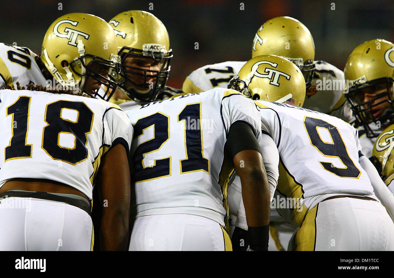 Georgia Tech players discuss a play during the first half of the Dr Pepper Atlantic Coast Conference Football Championship Game between the Georgia Tech Yellow Jackets and the Clemson Tigers being played at Raymond James Stadium in Tampa, FL. (Credit Image: © Chris Grosser/Southcreek Global/ZUMApress.com) Stock Photo