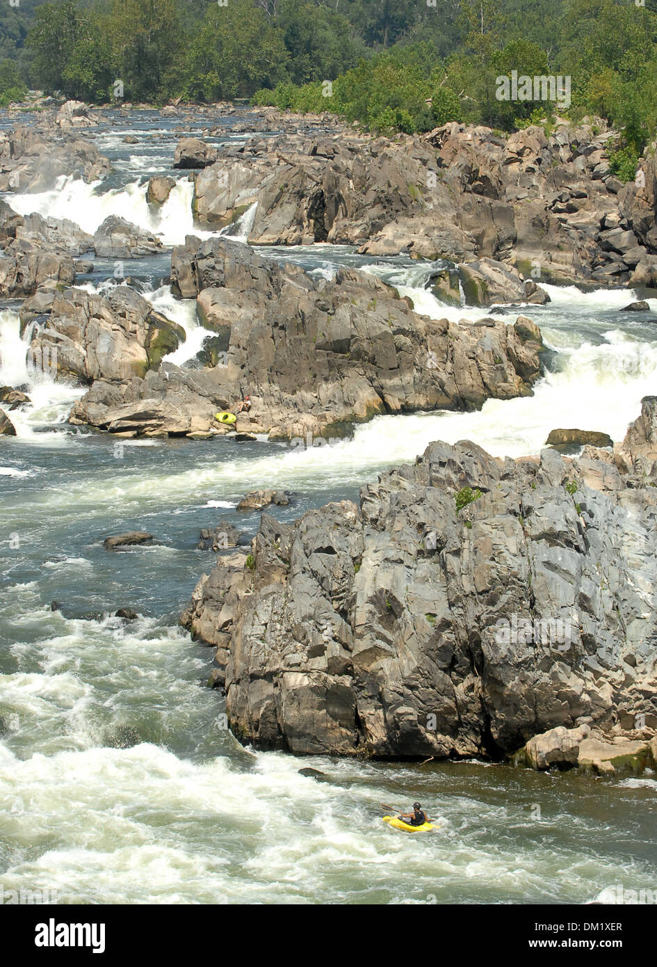 Great Falls Park Virginia on Potomac River flows over jagged rocks and builds up speed as it falls over series of rocks, Stock Photo