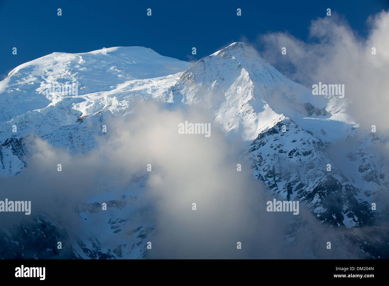 Mont Blanc appearing through the clouds, les Alps, Haute-Savoie, France Stock Photo