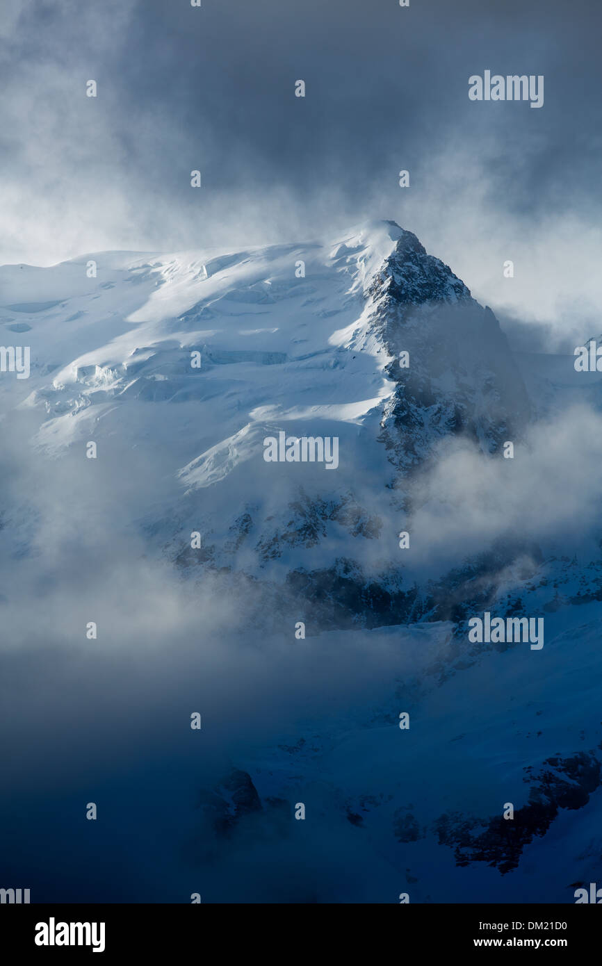 Mont Blanc appearing through the clouds, les Alps, Haute-Savoie, France Stock Photo