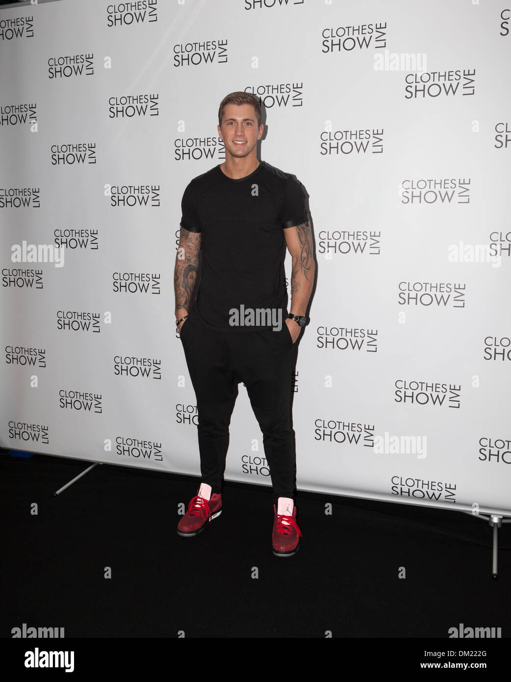 Birmingham, UK. 10th December 2013. Danny Osborne is a start of ITVs The Only Way is Essex (TOWIE) pictured here at the Clothes Show Live promoting his new calender launch Credit:  Paul Hastie/Alamy Live News Stock Photo