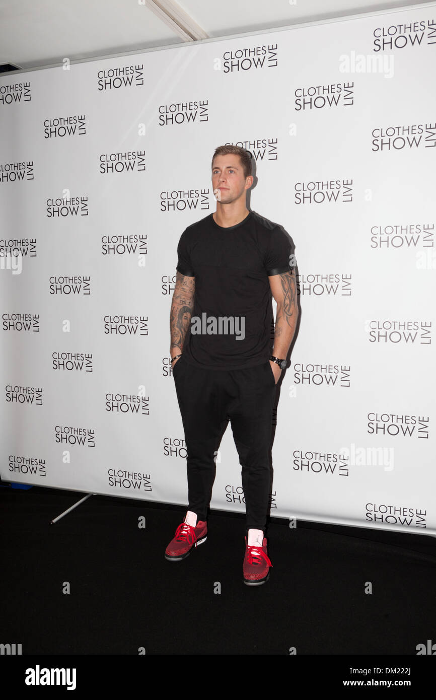 Birmingham, UK. 10th December 2013. Danny Osborne is a start of ITVs The Only Way is Essex (TOWIE) pictured here at the Clothes Show Live promoting his new calender launch Credit:  Paul Hastie/Alamy Live News Stock Photo