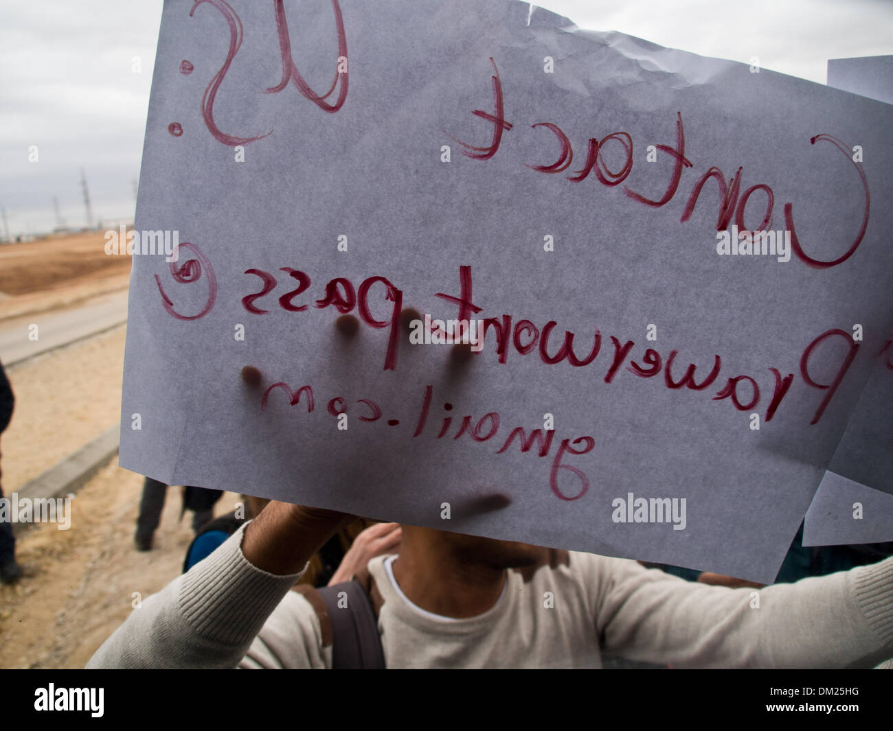 Northern Negev, Israel. 10th Dec, 2013. An impromptu demonstration breaks out protesting government's Prawer-Begin Plan on the outskirts of Rahat, the first and only Bedouin city in the world. Rahat, Israel. 10-Dec-2013.  Israel's Prime Minister's Office pushes forward the Legislation for the Arrangement of Bedouin Settlement in the Negev following a first reading in the Knesset and despite widespread controversy and violent demonstrations over past weeks. Credit:  Nir Alon/Alamy Live News Stock Photo