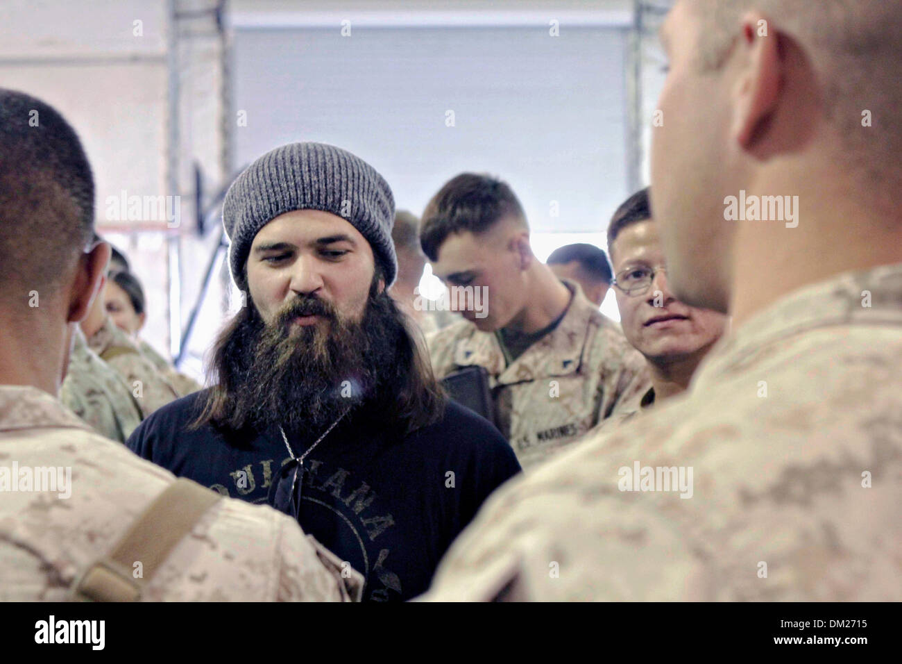 Afghanistan. 10th Dec, 2013. Duck Dynasty reality television star Jep Robertson signs autographs for Marines December 10, 2013 at Camp Leatherneck, Afghanistan.  Robertson's visit is part of the annual USO holiday tour to help boost the moral of service members deployed overseas. Credit:  Planetpix/17�Թ����� Live News Stock Photo