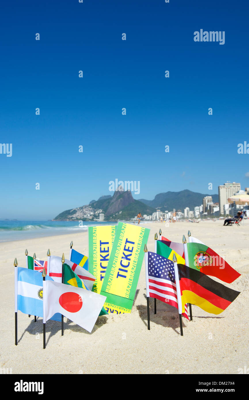 Brazil tickets with international world flags on the beach in Rio de Janeiro Stock Photo