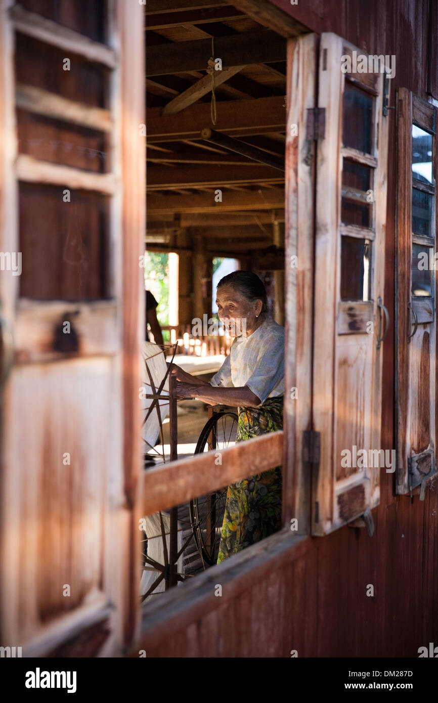 a woman isolating lotus threads for weaving, In Phaw Khone, Inle Lake, Myanmar (Burma) Stock Photo