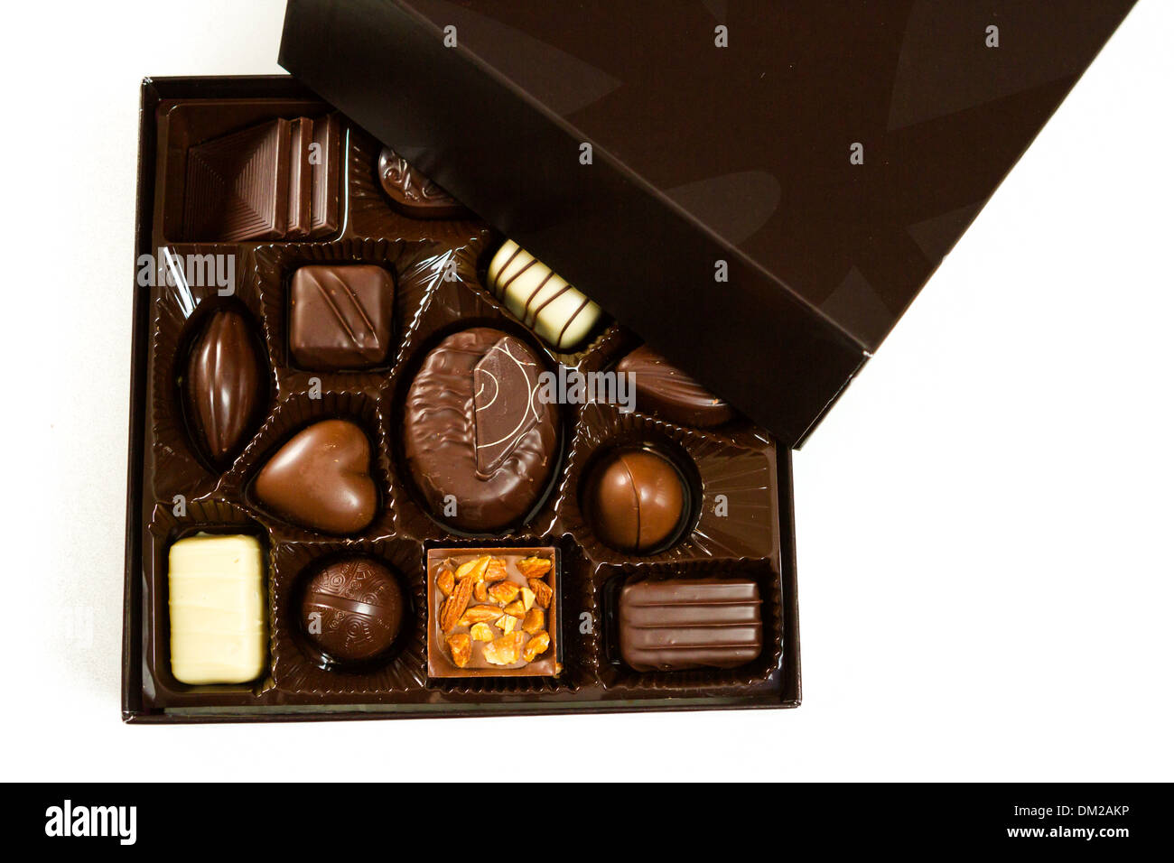 Gourmet chocolates in a square box on a white background Stock Photo