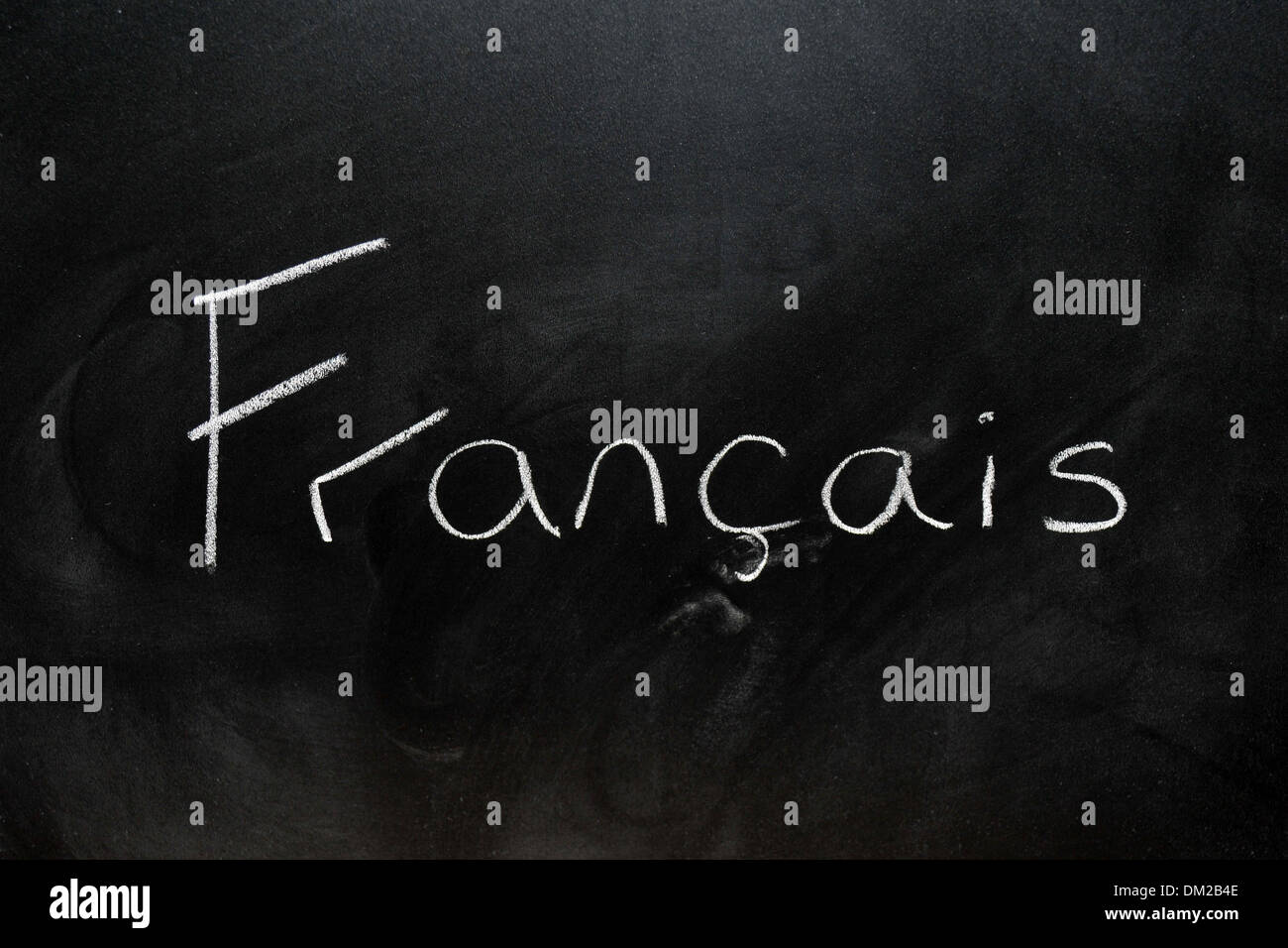 Close up of a blackboard with Francais written on it in chalk Stock