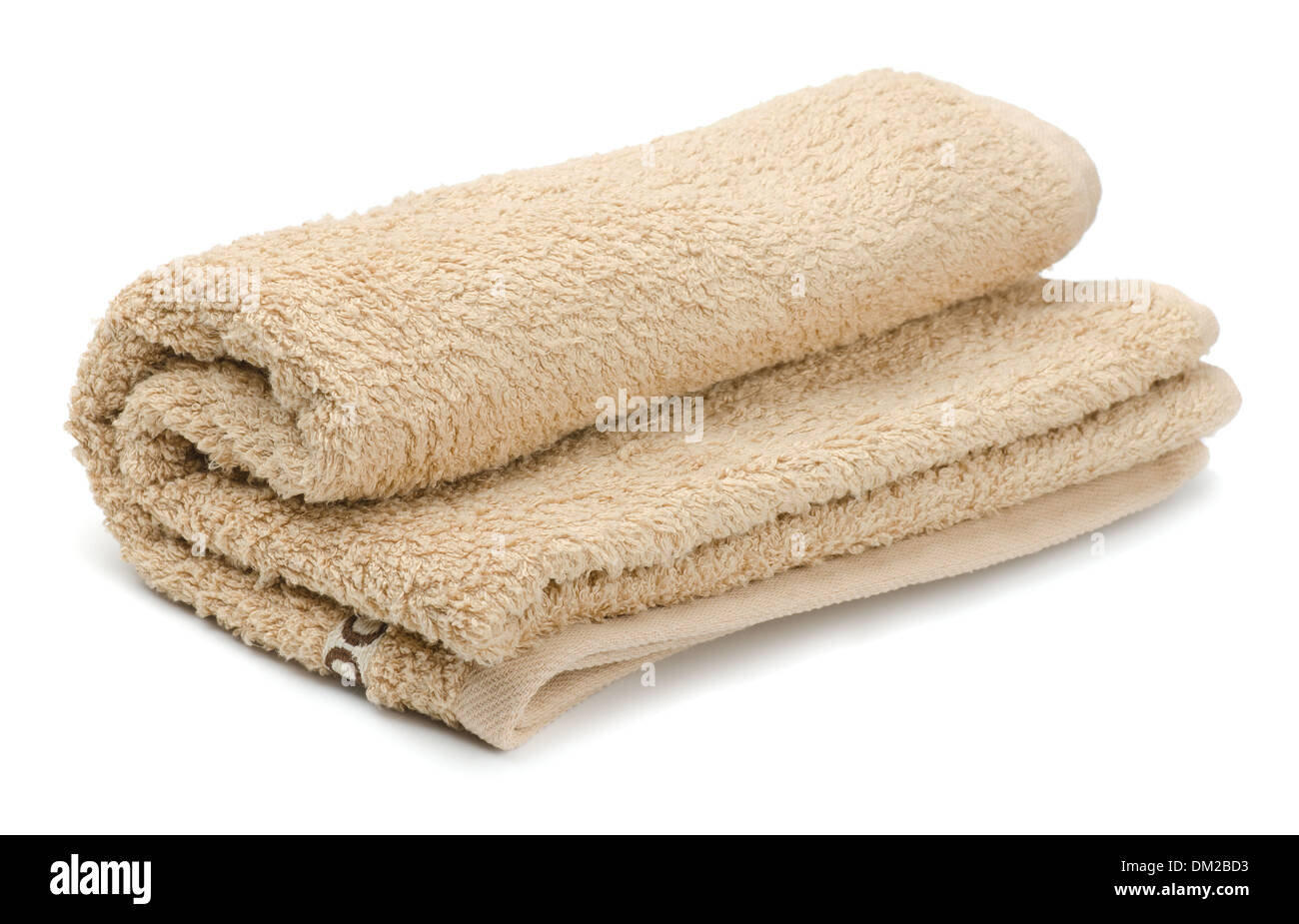 Rolled beige bath terry towels Stock Photo