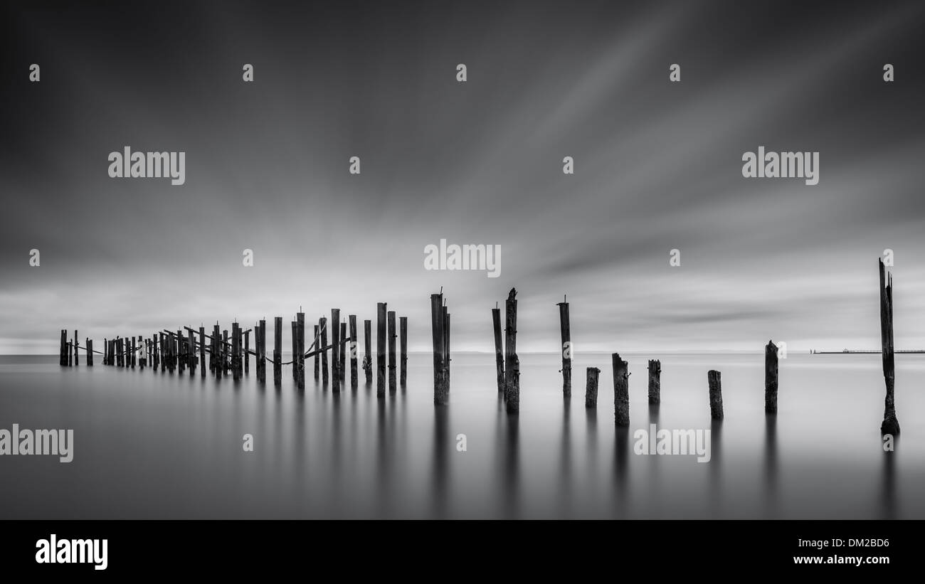 Dreams of Desolation: Fine Art seascape with a decayed pier Stock Photo