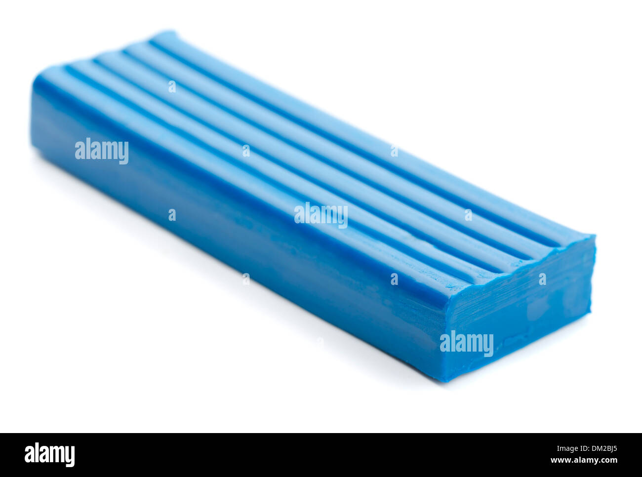 Blue bar of plasticine isolated on white Stock Photo