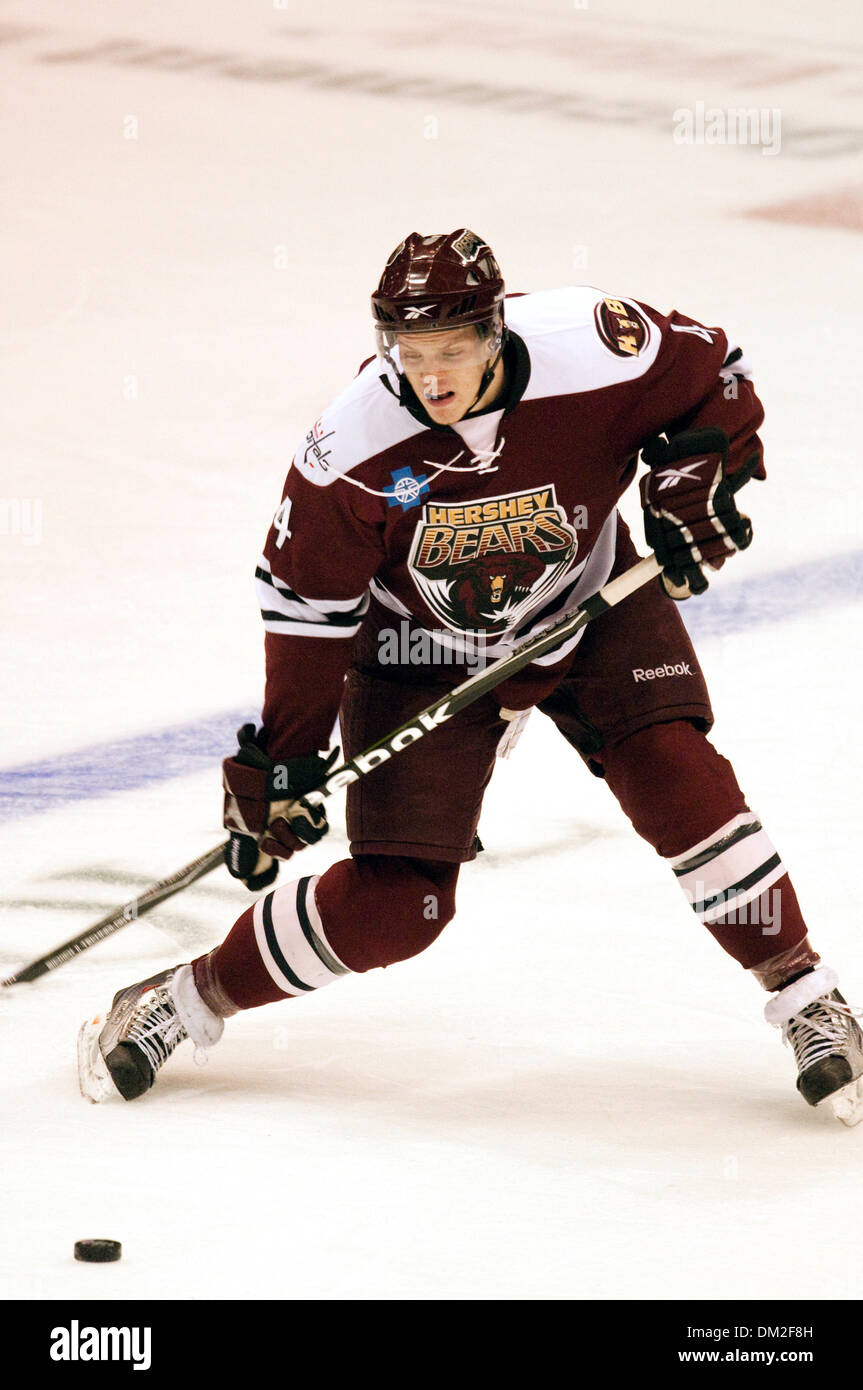 Hershey Bears defender John Carlson (#4) skates with the puck during a game  against the Rochester Americans. The Hershey Bears defeated the Rochester  Americans 3-1 at the Blue Cross Arena in Rochester