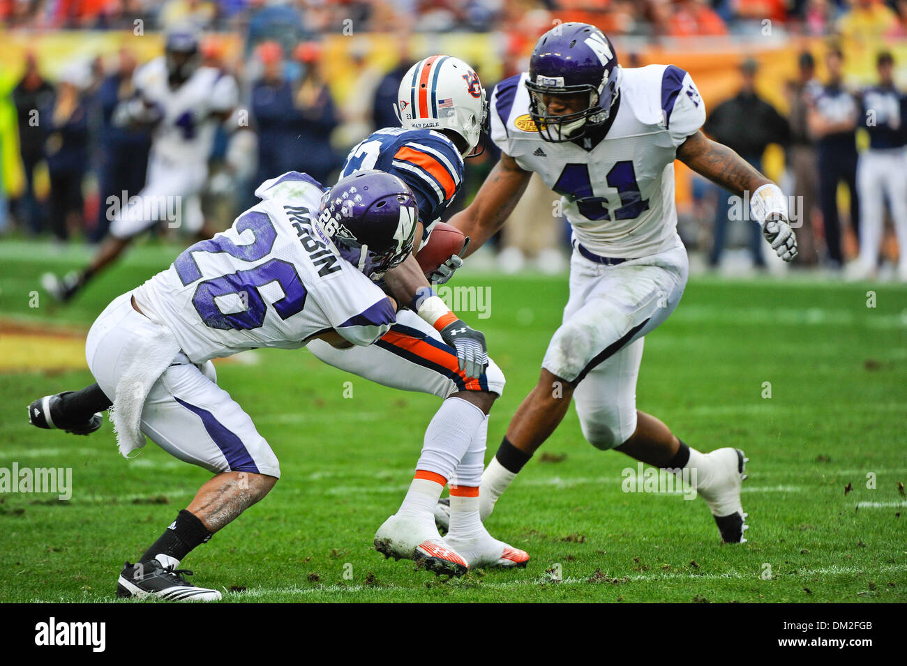 41 Northwestern Line Backer Quentin Davie closes in a tackle during the