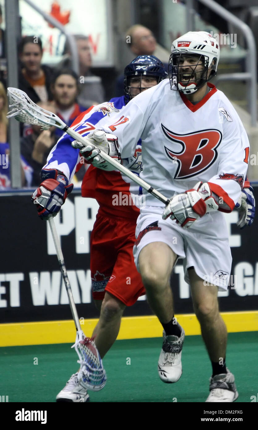 Boston Blazers defenseman Jon ''Bubba'' Durno (12) carries the ball ...