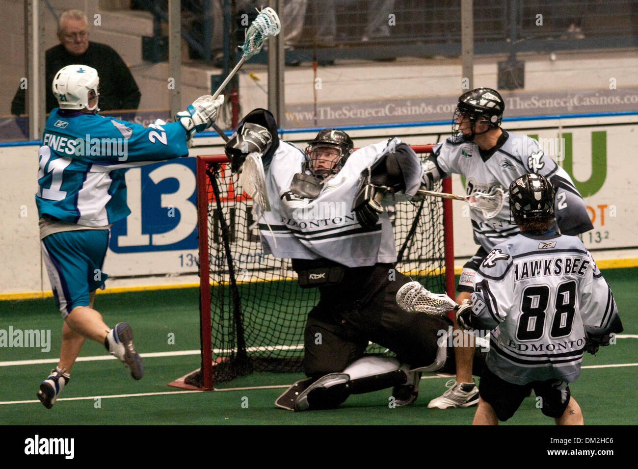 Rochester Knighthawks defender Kevin Fines (21) scores a goal against