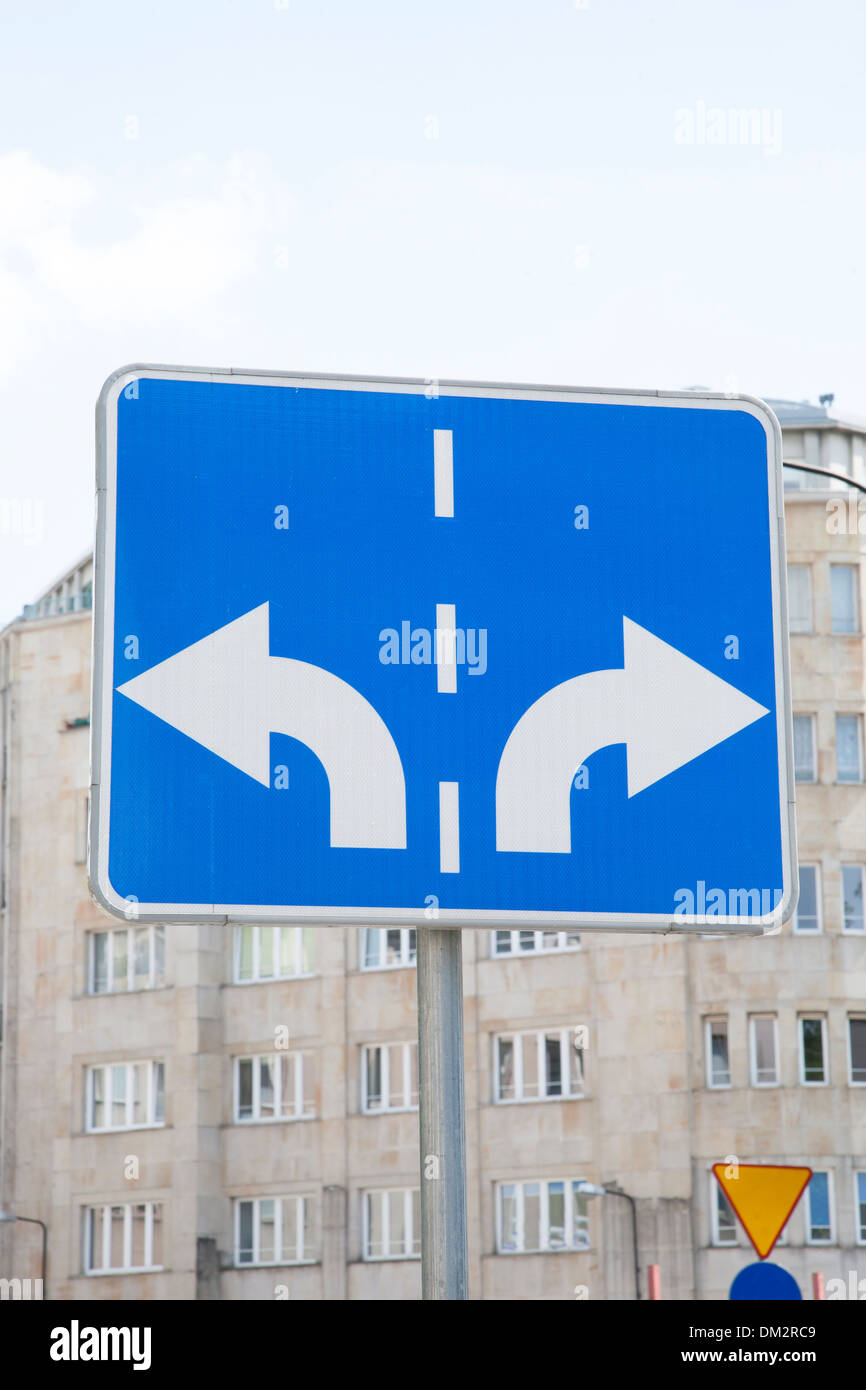 Traffic Sign with Two Arrows Pointing in Different Directions Stock