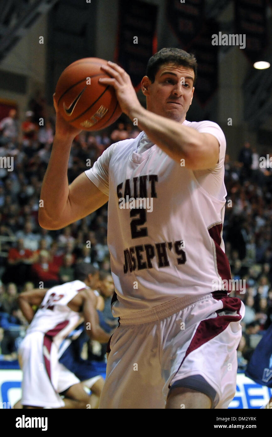 St. Josephs Center Todd O'Brien #2 rebounds the ball during the first ...