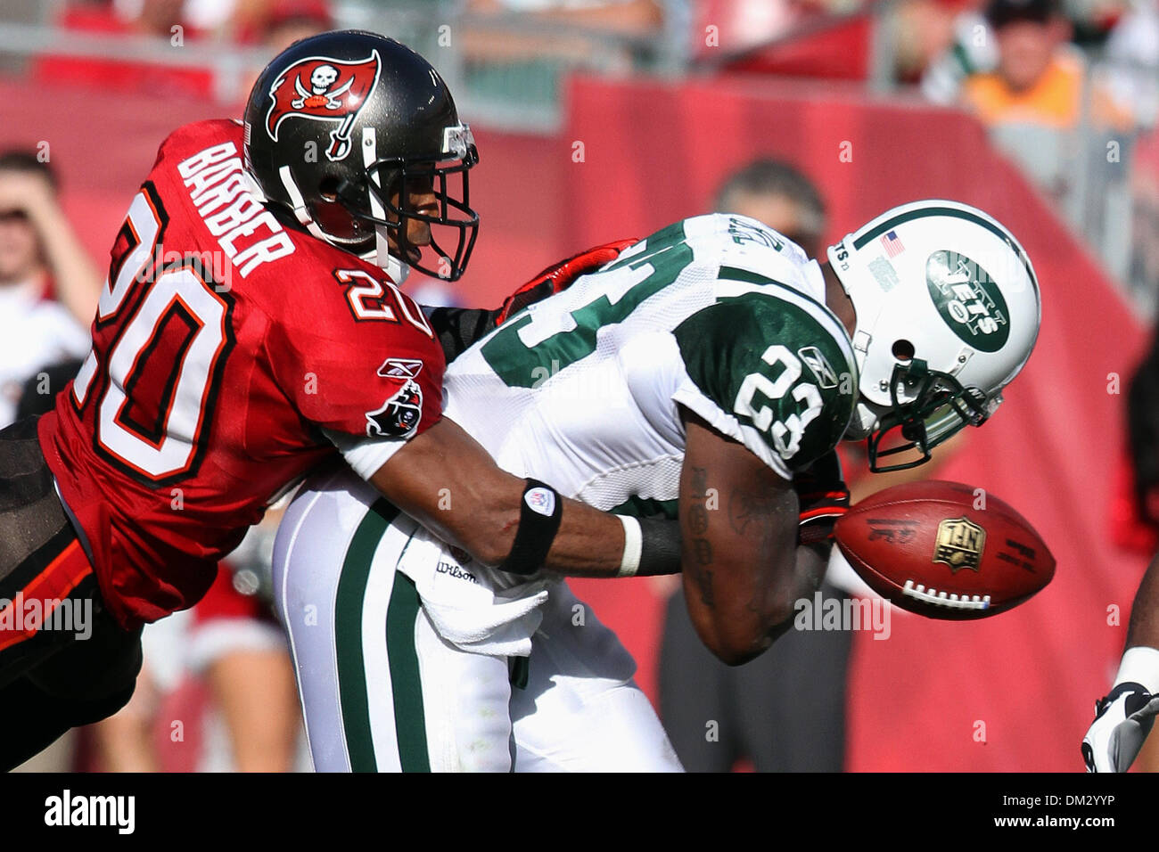 Tampa Bay Buccaneers cornerback Ronde Barber (20) strips the ball