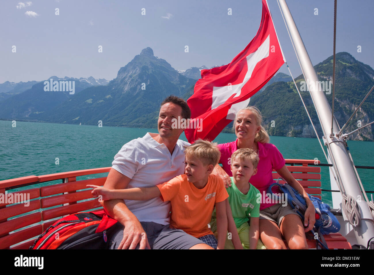 Switzerland Europe lake Lucerne central Switzerland steamboat family ship boat ships boats canton UR Uri Swiss flag lake Stock Photo